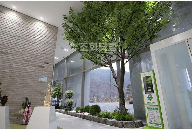 공주 애터미파크 — 대형 인조나무가 채운 홀