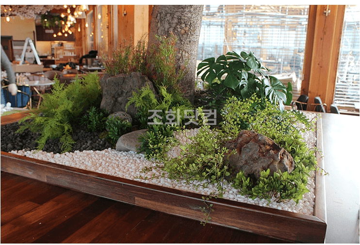 원주 베이커리 궁 — 관목과 자연석이 어우러진 화단 디테일
